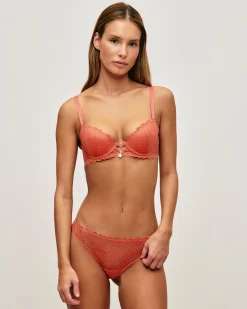 Tanga en dentelle avec fil lurex doré et bijou