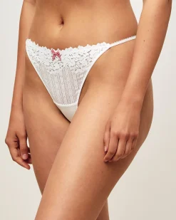Tanga en dentelle florale et noeud